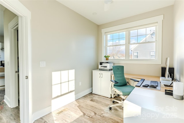 office space featuring light hardwood / wood-style flooring