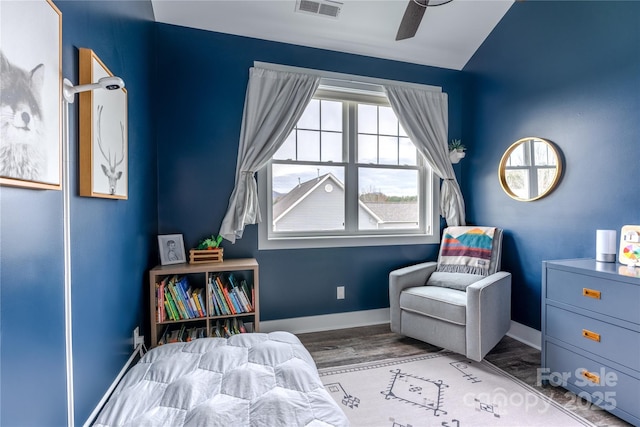 living area featuring ceiling fan