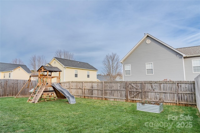 view of yard with a playground