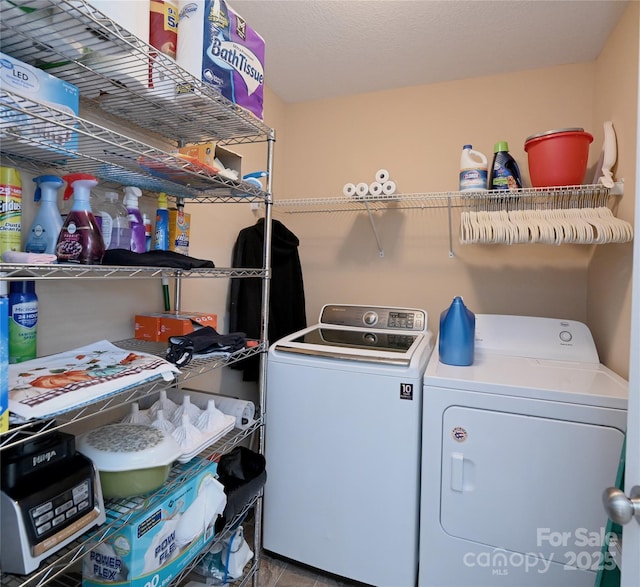 washroom with separate washer and dryer