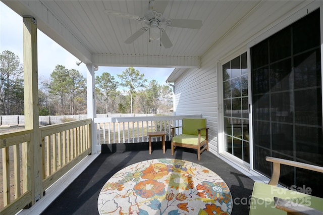 wooden deck with ceiling fan