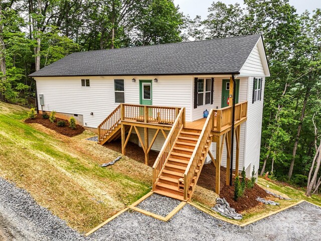 430 Hague Dr, Columbus, NC 28722 - ranch-style home with stairs, a shingled roof, crawl space, a front yard, and a deck