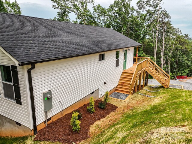 430 Hague Dr, Columbus, NC 28722 - view of side of property featuring crawl space, stairway, roof with shingles, and a deck