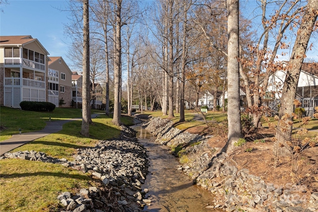 view of community with a lawn