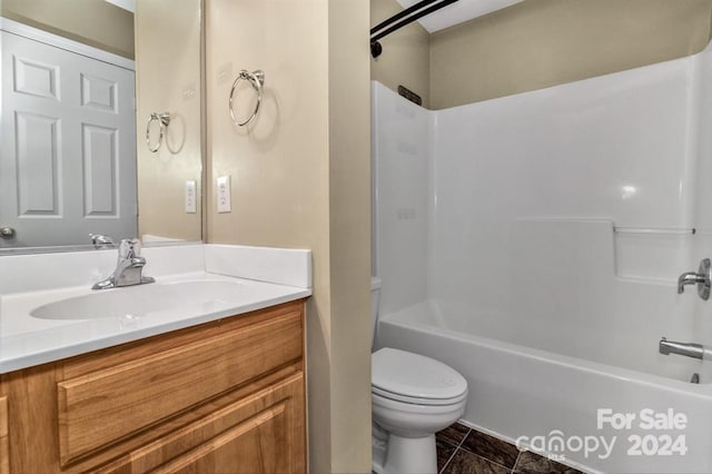 full bathroom featuring tile patterned flooring, shower / tub combination, vanity, and toilet