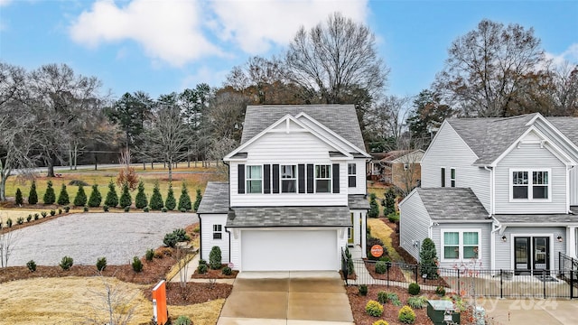 view of front property with a garage