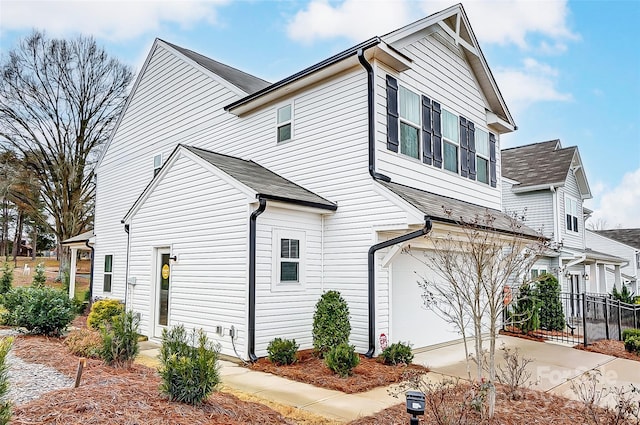 view of property exterior featuring a garage