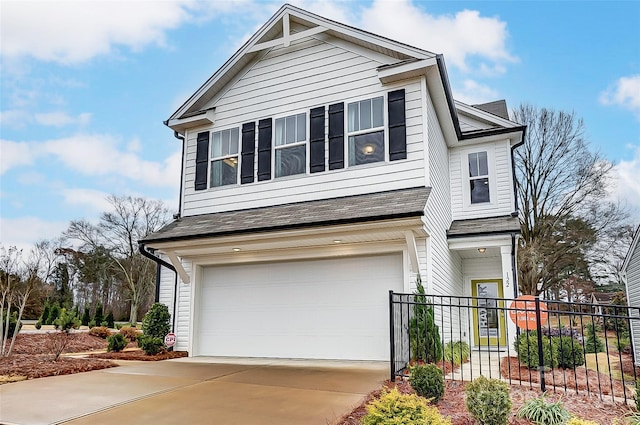 view of front of property with a garage