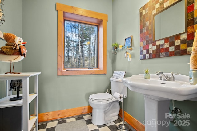 bathroom featuring toilet