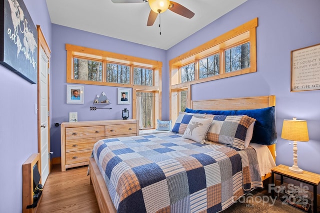 bedroom featuring ceiling fan and light wood-type flooring