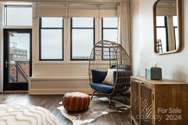 sitting room featuring dark hardwood / wood-style floors