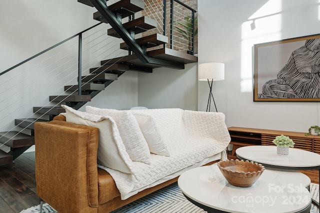 living room featuring dark wood-type flooring