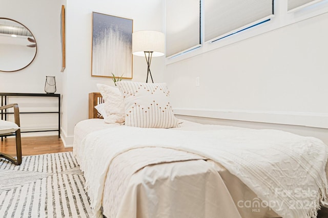 bedroom featuring wood-type flooring