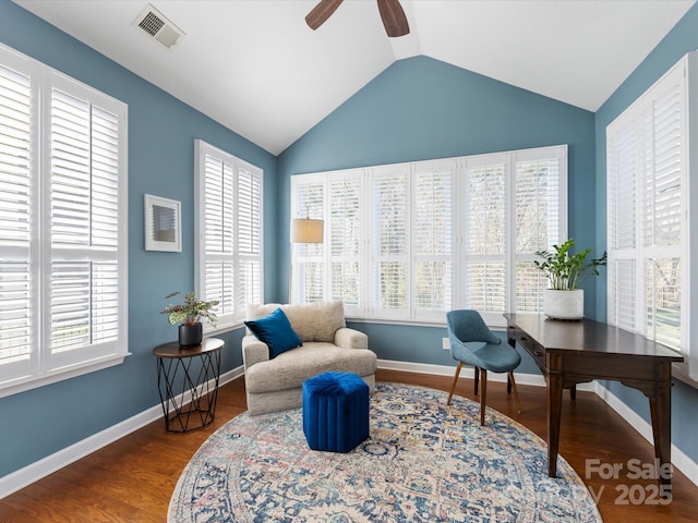 sitting room with hardwood / wood-style floors, ceiling fan, and lofted ceiling