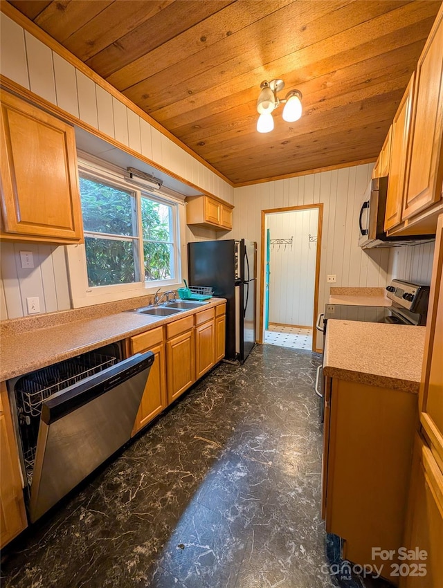 kitchen featuring appliances with stainless steel finishes, wood ceiling, light countertops, and a sink