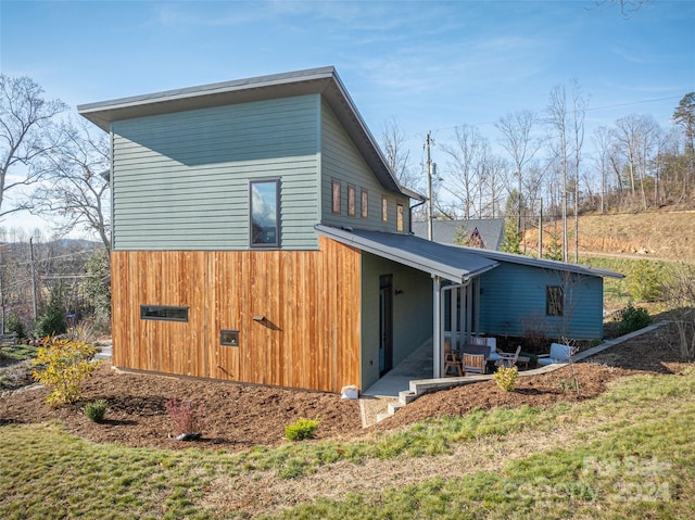 view of home's exterior featuring a patio area