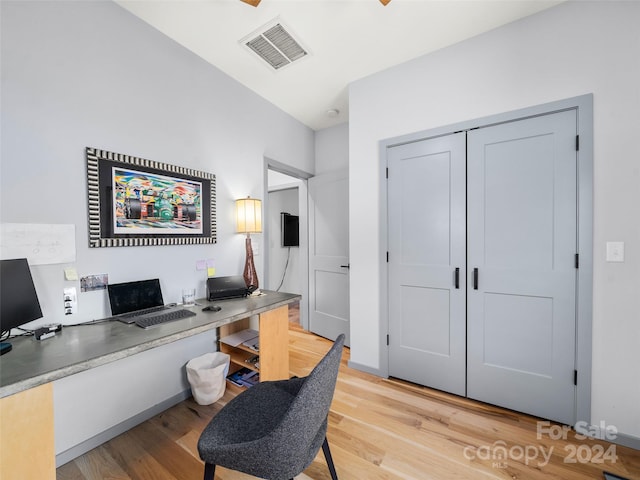 office area with light hardwood / wood-style flooring