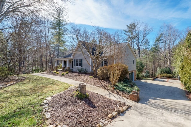 view of property exterior with a garage