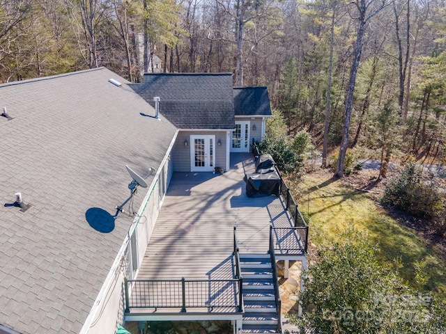 rear view of property featuring french doors