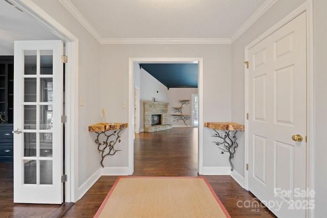 interior space with ornamental molding and dark hardwood / wood-style floors