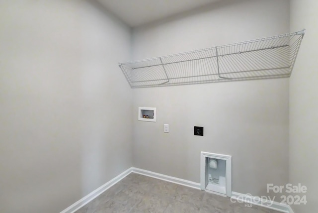 laundry room featuring hookup for an electric dryer and hookup for a washing machine