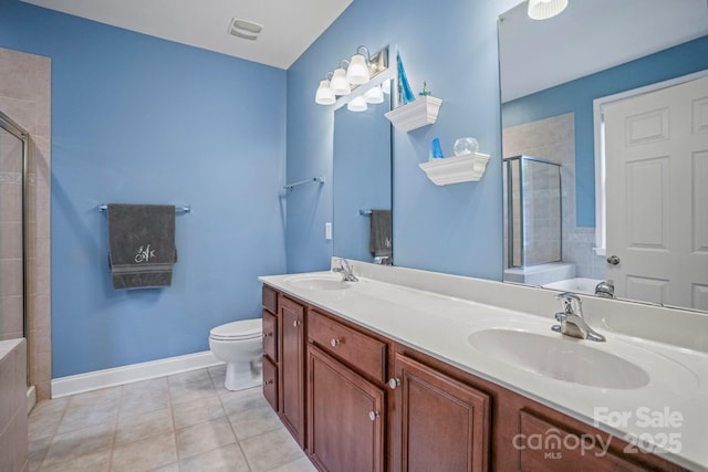 full bathroom with tile patterned floors, vanity, plus walk in shower, and toilet