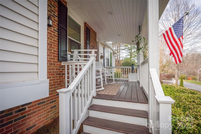 wooden terrace with covered porch