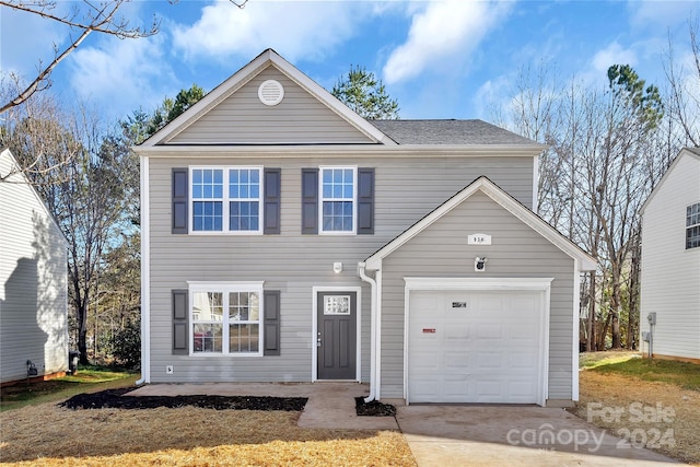 view of front of home featuring a garage