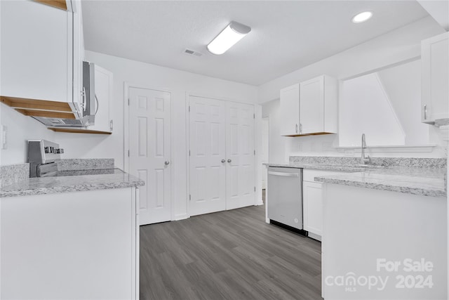 kitchen featuring a textured ceiling, dark wood-type flooring, dishwasher, range, and white cabinetry