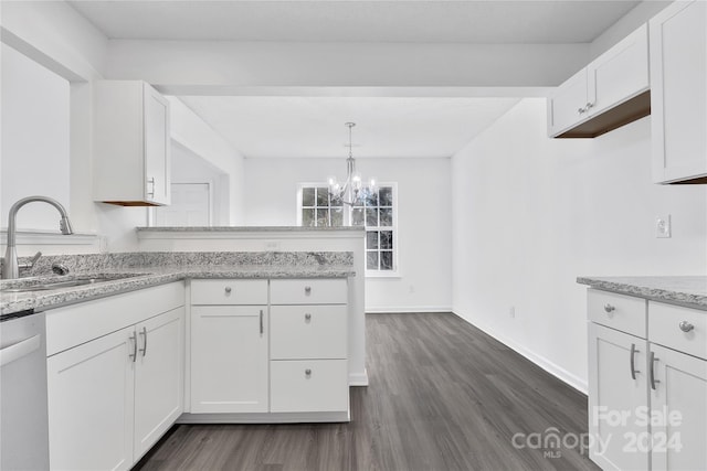 kitchen featuring white cabinets, dark hardwood / wood-style flooring, sink, and white dishwasher