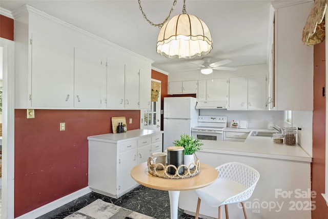 kitchen featuring white appliances, white cabinets, decorative light fixtures, sink, and crown molding