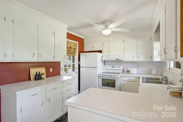 kitchen featuring sink, white appliances, white cabinets, and ornamental molding