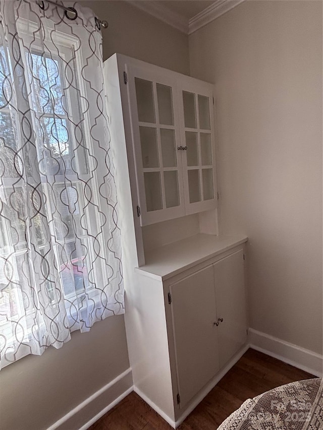 details with crown molding and wood-type flooring