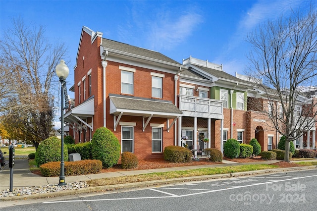 view of property featuring a balcony