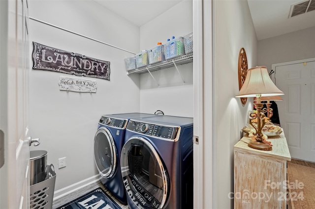 laundry room featuring washer and dryer