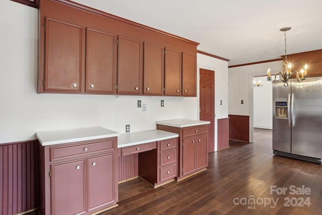 kitchen with dark wood-type flooring, an inviting chandelier, crown molding, stainless steel fridge, and decorative light fixtures