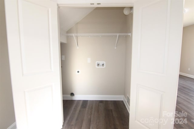 laundry room featuring electric dryer hookup, dark wood-type flooring, and washer hookup