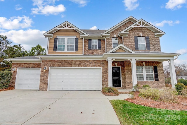 craftsman-style home with a garage