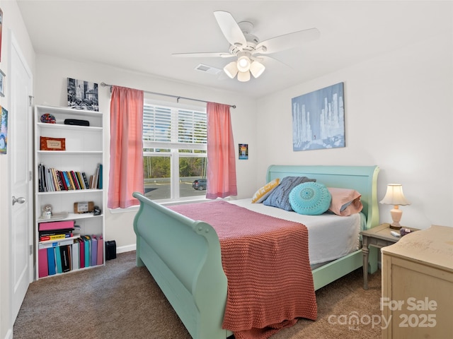 carpeted bedroom with ceiling fan