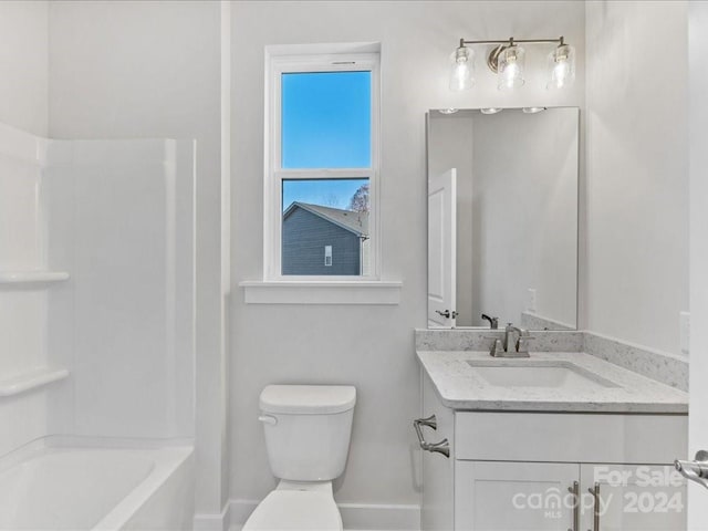 full bathroom featuring vanity, toilet, and shower / bathtub combination