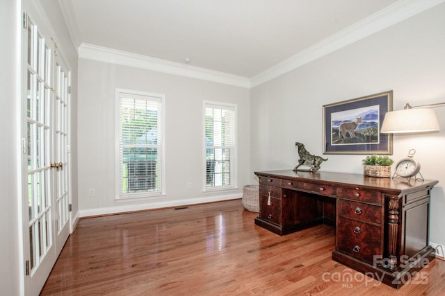 office featuring ornamental molding and light wood-type flooring