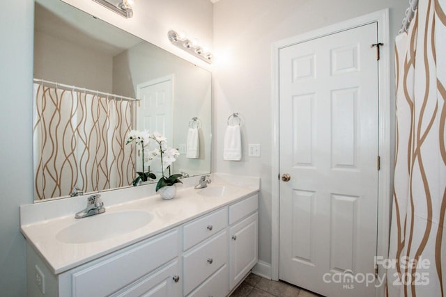 bathroom featuring vanity and tile patterned floors