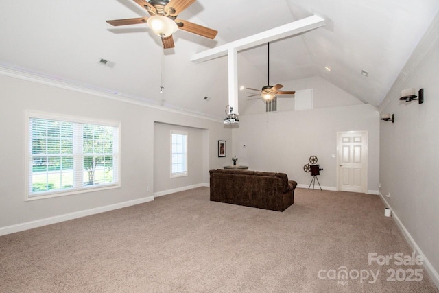 carpeted living room featuring ceiling fan and high vaulted ceiling