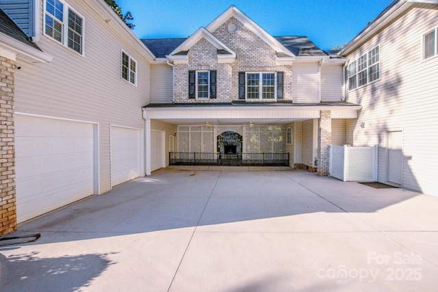 view of front of home featuring a garage and covered porch