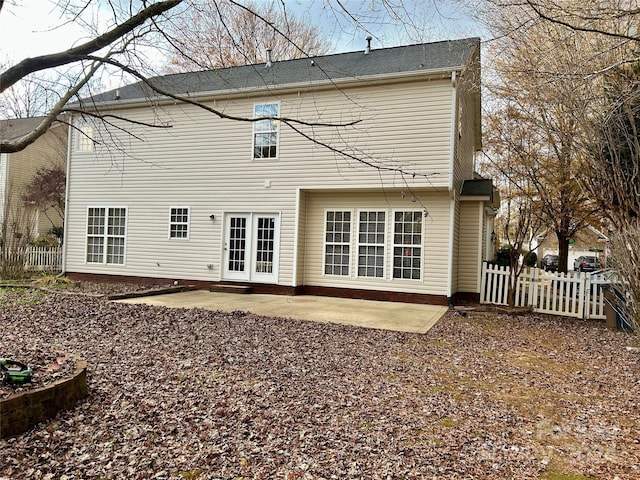 rear view of house featuring a patio