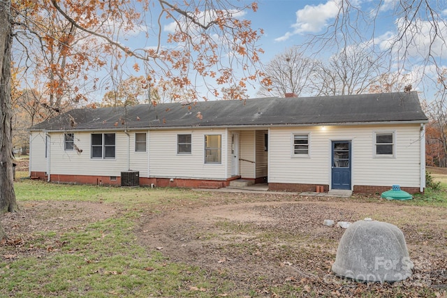 back of property featuring central air condition unit