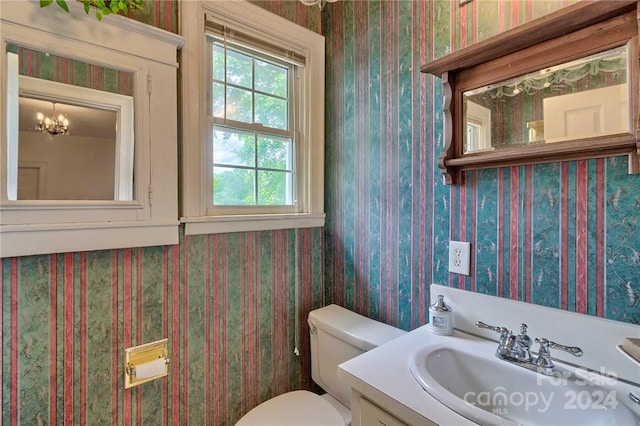 bathroom with vanity and toilet