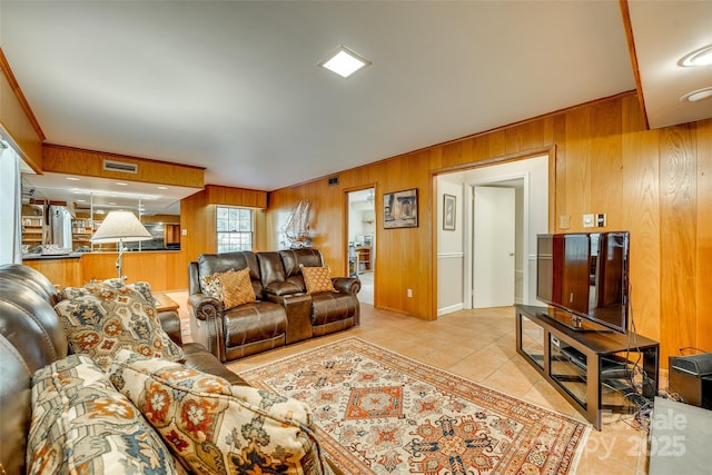 tiled living room with wooden walls and crown molding