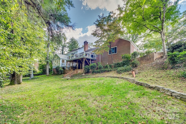 view of yard featuring a deck