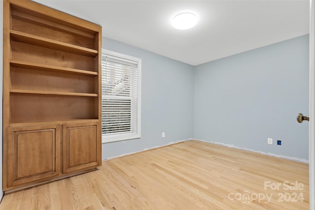 unfurnished bedroom featuring light hardwood / wood-style floors